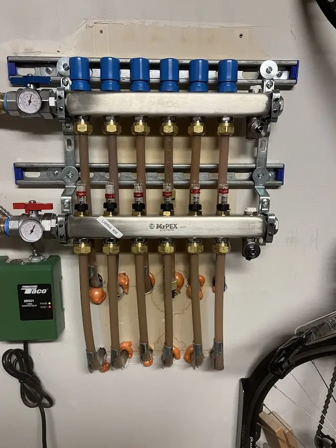 Plumber performing Gas Line Installation at a residential property in Clay